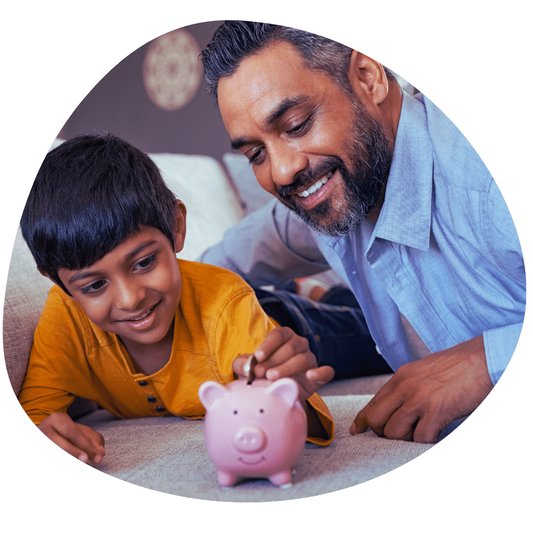 parent and son with piggy bank
